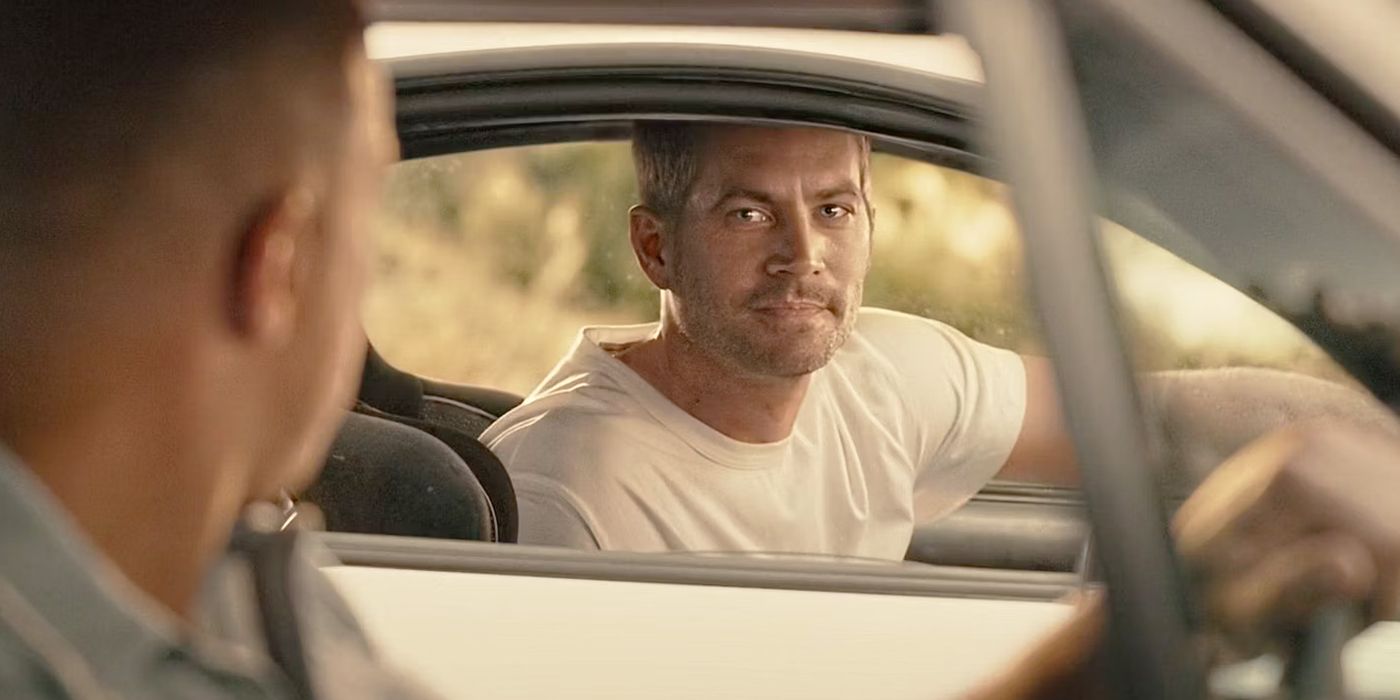 Brian O'conner en Furious 7 hablando con Dom a través de la ventana de un auto.